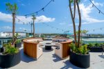 The IT Residences rooftop area with fire pit with Seaview